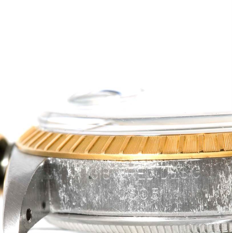 This image shows a close-up side view of the Vintage Collection model by Rolex, highlighting its bezel and part of the case.