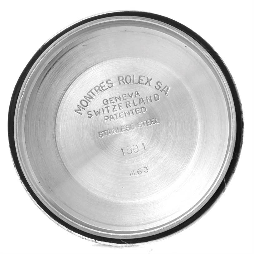 This image shows the inside case back of a Vintage Collection Rolex watch, engraved with brand details.