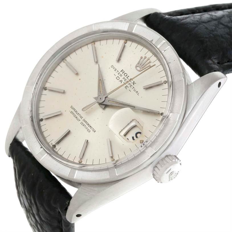 The image shows a close-up view of the Vintage Collection Rolex watch, highlighting its dial, bezel, crown, and leather strap.