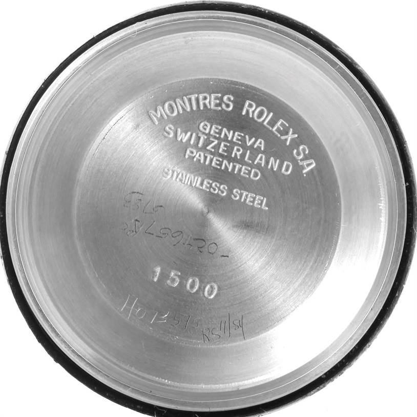 This image shows the inside of the case back for a Rolex Vintage Collection 1500 Men's Stainless Steel Blue Dial 1500 Men's Stainless Steel Blue Dial model with the brand markings and model number inscribed.