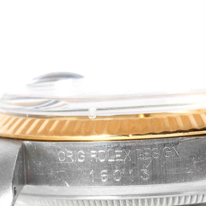 The image shows a close-up side view of the bezel and case of a Rolex Vintage Collection 16013 Men's Stainless Steel Champagne Dial 16013 Men's Stainless Steel Champagne Dial model 16013 watch.