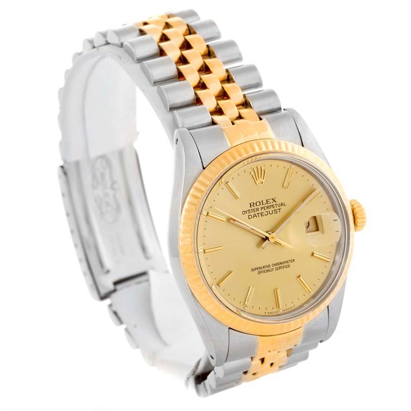 This image shows a side-angle view of the Rolex Vintage Collection 16013 Men's Stainless Steel Champagne Dial 16013 Men's Stainless Steel Champagne Dial model, displaying its two-tone bracelet and gold dial with a date window.