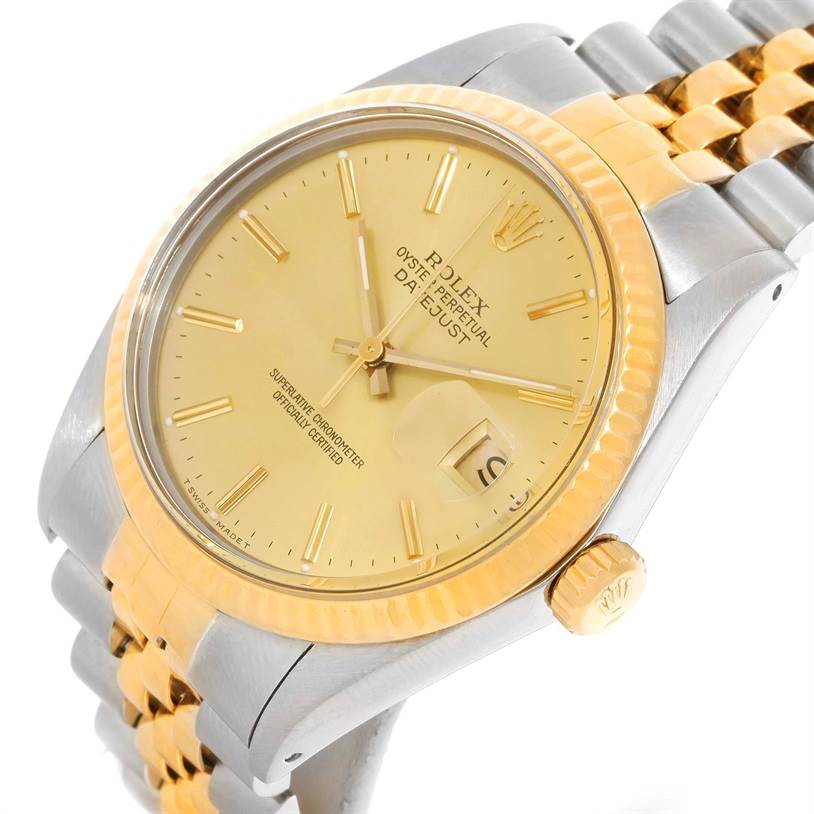 The image shows a close-up angled view of the face, gold bezel, and part of the bracelet of a Rolex Vintage Collection 16013 Men's Stainless Steel Champagne Dial 16013 Men's Stainless Steel Champagne Dial watch.
