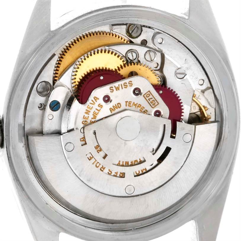 The image shows the internal mechanism and parts of a Rolex Vintage Collection 1601 Men's Stainless Steel Silver Dial 1601 Men's Stainless Steel Silver Dial watch from the back.