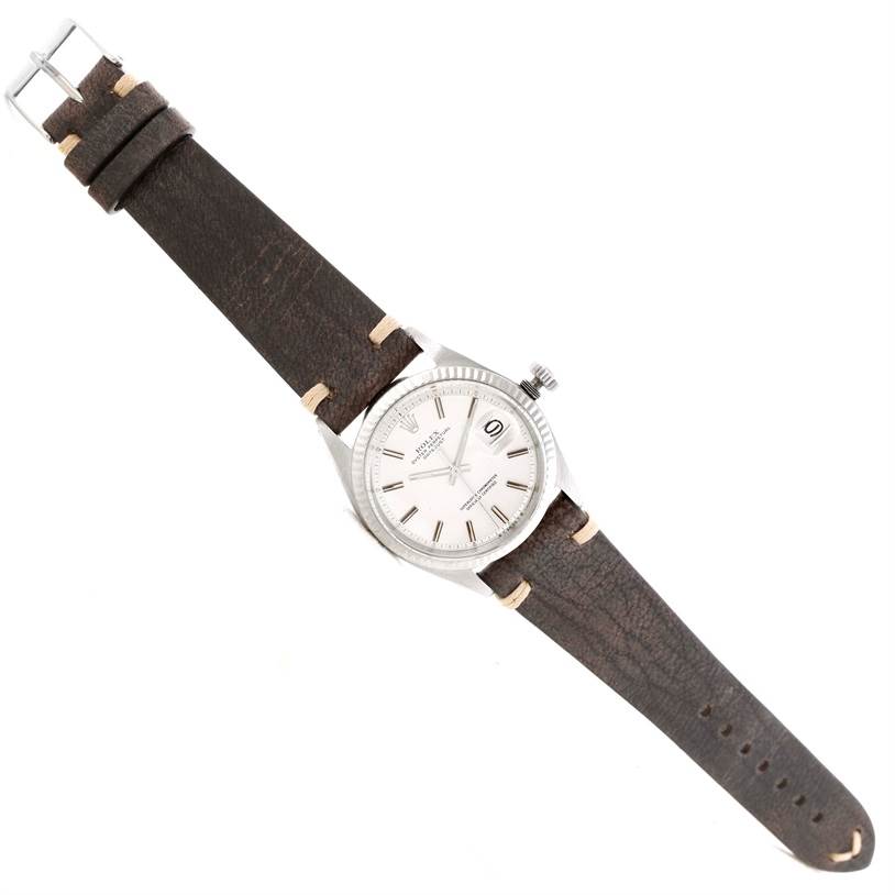 This Rolex Vintage Collection 1601 Men's Stainless Steel Silver Dial 1601 Men's Stainless Steel Silver Dial watch is shown from a top-down angle, displaying the dial, case, crown, and full leather strap.