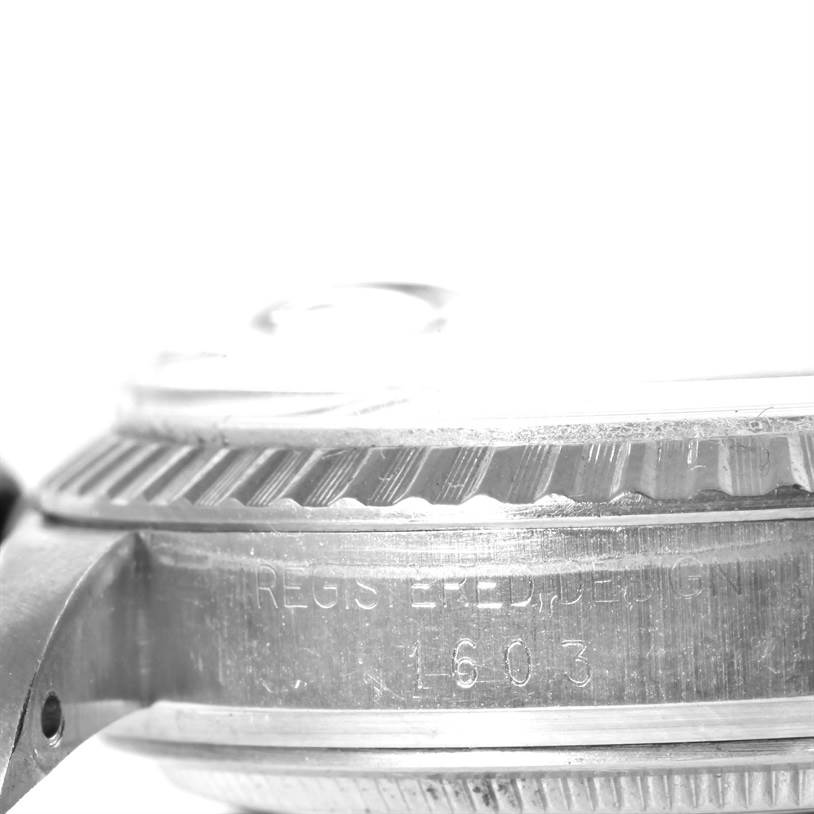 The close-up angle shows the side view of a Rolex Vintage Collection 1603 Men's Stainless Steel Silver Dial 1603 Men's Stainless Steel Silver Dial model, highlighting the bezel and engraved serial number "1603."