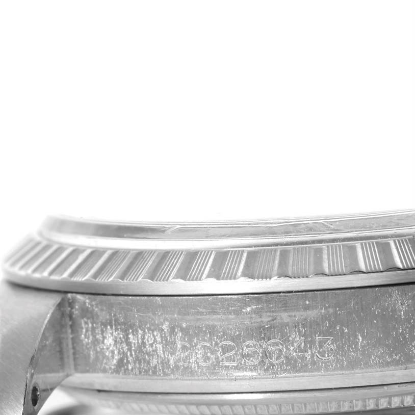 The image shows a side view of the bezel and case, including serial numbers, of a Vintage Collection model by Rolex.