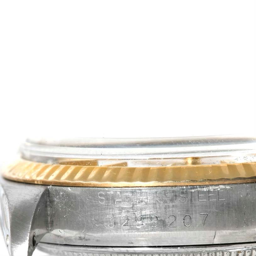 The image shows a close-up, side view of the watch case, crown, bezel, and glass of a Rolex Vintage Collection 1601 Men's Stainless Steel Silver Dial 1601 Men's Stainless Steel Silver Dial watch.