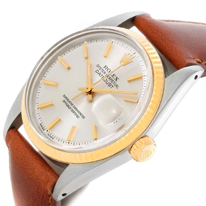 The image shows a close-up angle of the dial and bezel of the Rolex Vintage Collection 1601 Men's Stainless Steel Silver Dial 1601 Men's Stainless Steel Silver Dial Datejust watch with a brown leather strap.