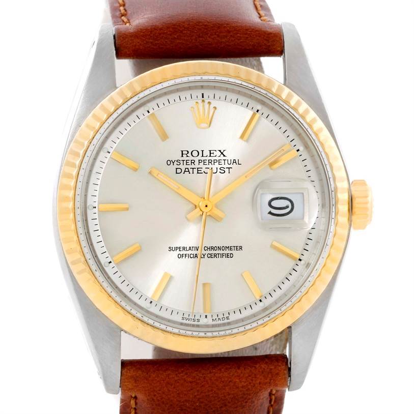 This image shows a frontal view of the Rolex Vintage Collection 1601 Men's Stainless Steel Silver Dial 1601 Men's Stainless Steel Silver Dial Datejust watch, highlighting the dial, bezel, and leather strap.