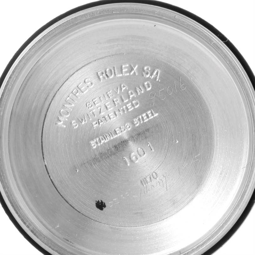 The image shows the inner case back of a Vintage Collection Rolex watch, model number 1601, with markings and engravings.