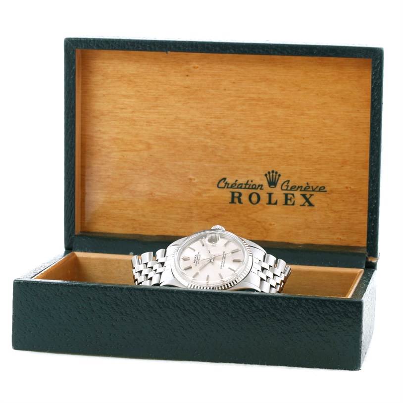 The image shows a Rolex Vintage Collection 1601 Men's Stainless Steel Silver Dial 1601 Men's Stainless Steel Silver Dial model watch from a slightly elevated front angle, placed inside an open Rolex box.