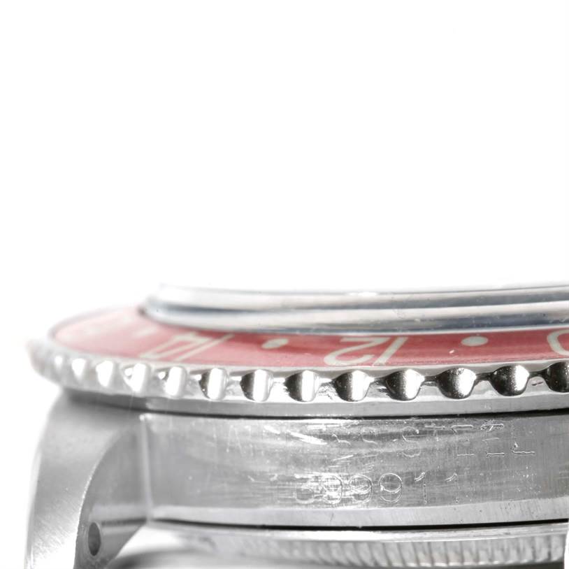 This image shows a close-up side view of the bezel and case of the Rolex Vintage Collection 16750 Men's Stainless Steel Black Dial 16750 Men's Stainless Steel Black Dial watch.