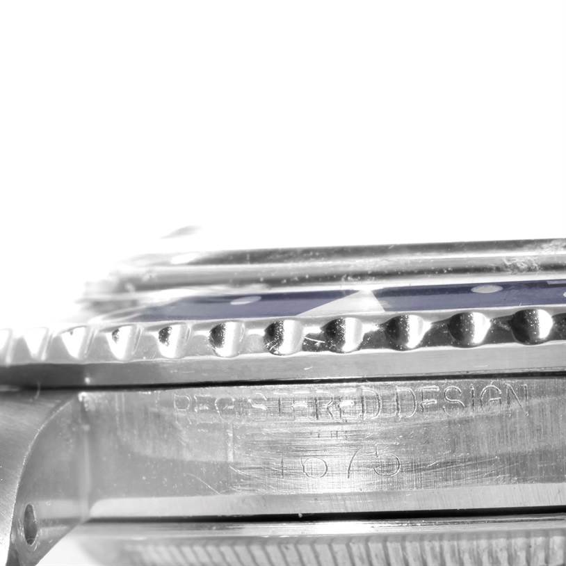 This close-up image of the Rolex Vintage Collection 16750 Men's Stainless Steel Black Dial 16750 Men's Stainless Steel Black Dial model shows the watch's side profile, focusing on the bezel and case engraving.