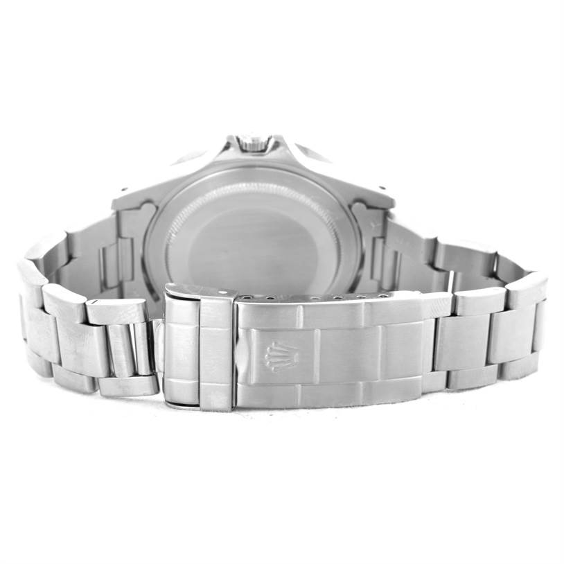 The image shows the backside and bracelet of a Vintage Collection Rolex watch, focusing on the clasp and case back.