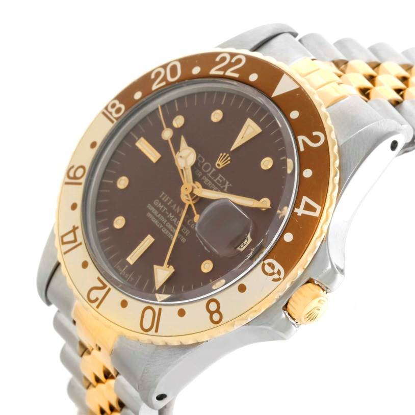 The image shows a close-up angle of the Rolex Vintage Collection 1675 Men
s Stainless Steel Brown Dial 1675 Men
s Stainless Steel Brown Dial watch, highlighting the bezel, dial, and part of the bracelet.