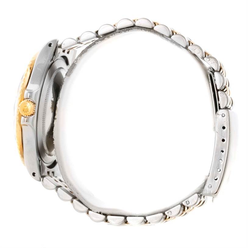 This side view of the Rolex Vintage Collection 1675 Men
s Stainless Steel Brown Dial 1675 Men
s Stainless Steel Brown Dial model shows the crown, case, and part of the bracelet.