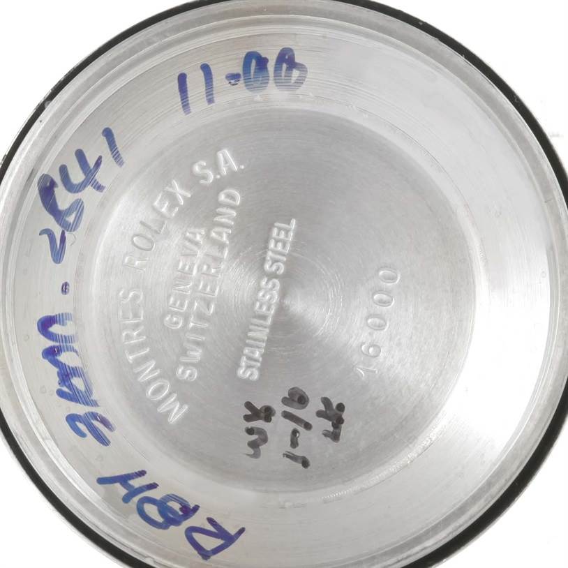 This image shows the inside case back of a Rolex Vintage Collection 16013 Men's Stainless Steel Black Dial 16013 Men's Stainless Steel Black Dial watch, displaying engraved inscriptions and handwritten markings.