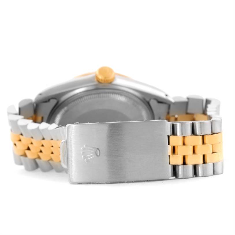 The image shows the back case and clasp of the Rolex Vintage Collection 16013 Men's Stainless Steel Black Dial 16013 Men's Stainless Steel Black Dial watch, highlighting the two-tone bracelet and the Rolex logo on the clasp.