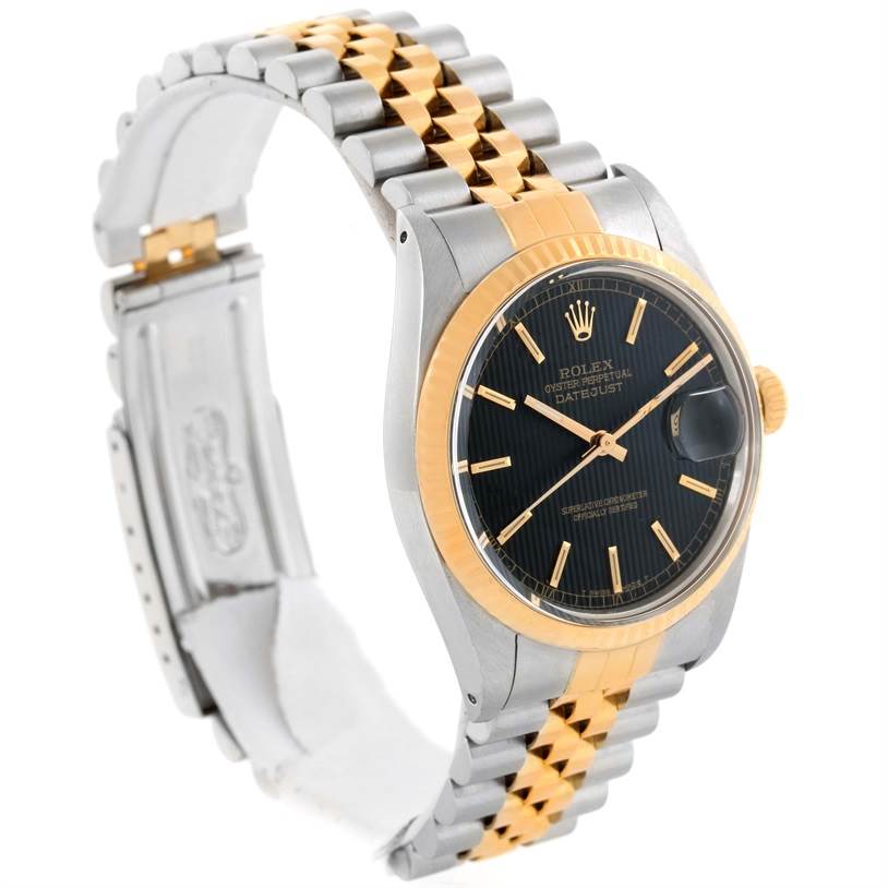 The image shows a side-angle view of a Rolex Vintage Collection 16013 Men's Stainless Steel Black Dial 16013 Men's Stainless Steel Black Dial Datejust watch, highlighting its two-tone bracelet and black dial.