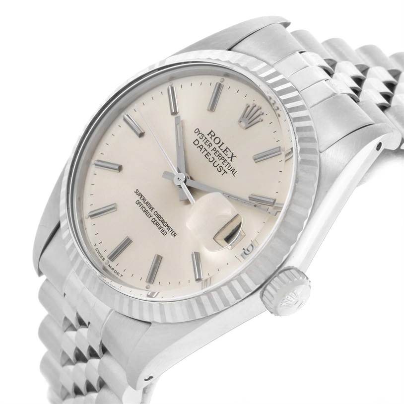 The Vintage Collection Rolex watch is shown at a front-right angle, highlighting the face, bezel, crown, and part of the bracelet.