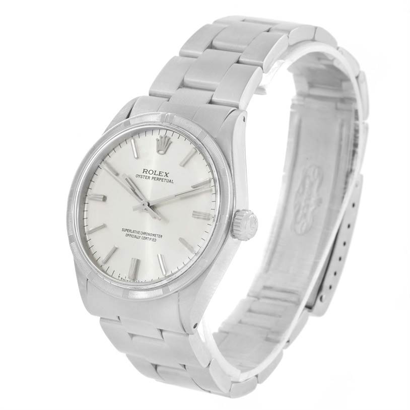 The Rolex Vintage Collection 1007 Men's Stainless Steel Silver Dial 1007 Men's Stainless Steel Silver Dial model watch is shown at a three-quarter angle, featuring its face, hour markers, hands, and metal bracelet.