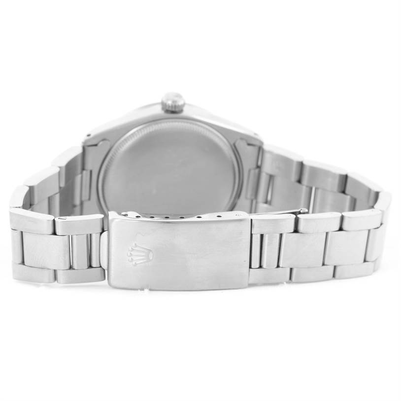 The image shows the back and clasp of a Vintage Collection model by Rolex, featuring a stainless steel bracelet.