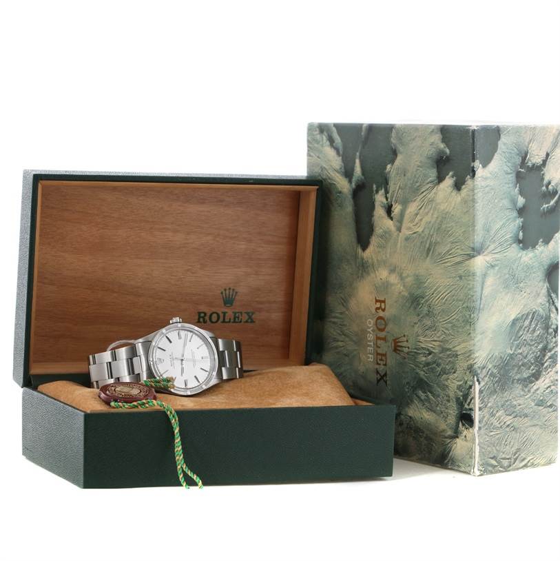 The Rolex Vintage Collection 1007 Men's Stainless Steel Silver Dial 1007 Men's Stainless Steel Silver Dial watch is displayed in an open box with a visible leather cushion and packaging.