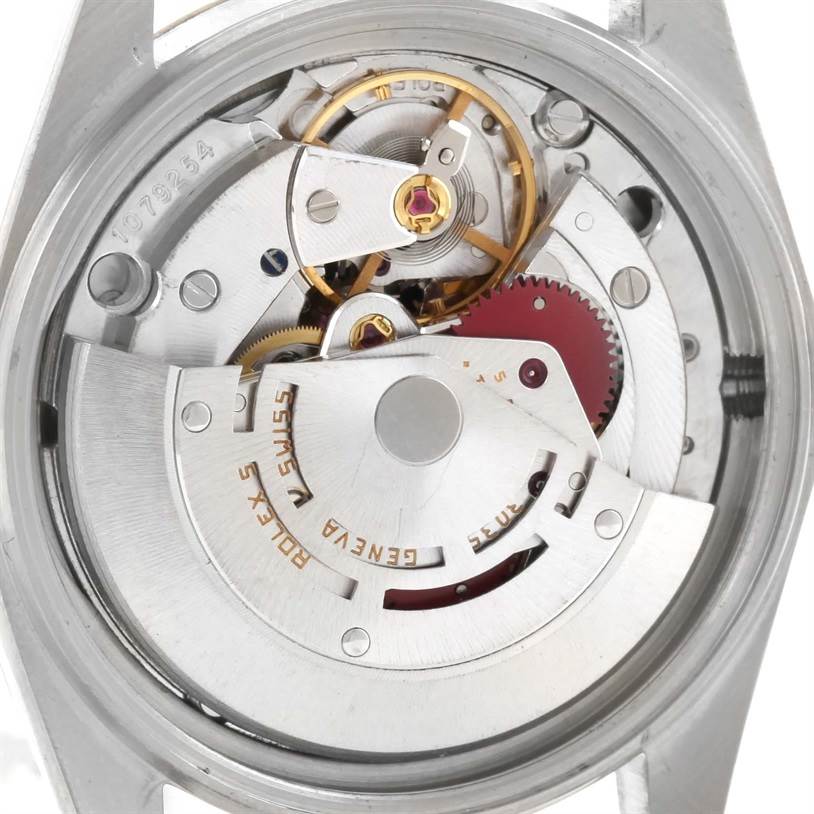This image shows the internal mechanism and movement of a Vintage Collection model by Rolex, viewed from the back case.