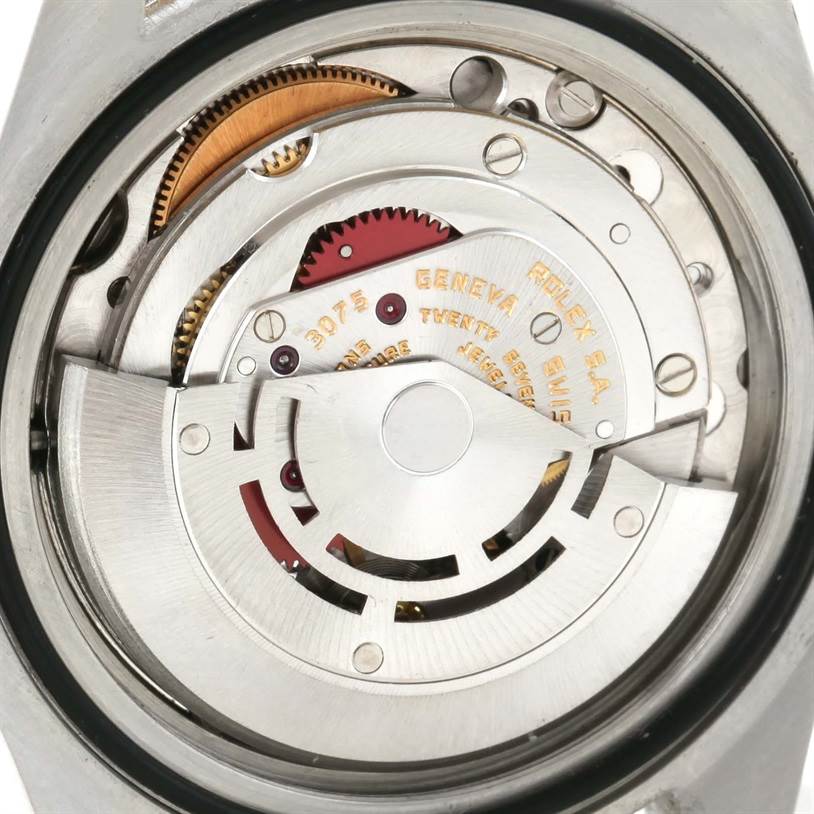 The image shows the internal mechanism of the Rolex Vintage Collection 16753 Men's Stainless Steel Black Dial 16753 Men's Stainless Steel Black Dial watch from a close-up bottom angle.