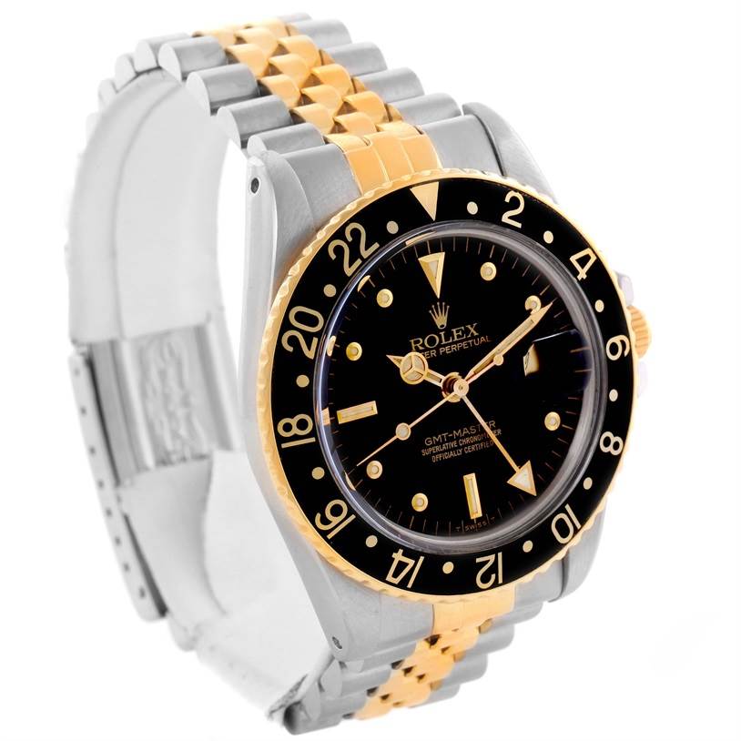 This image shows the Rolex Vintage Collection 16753 Men's Stainless Steel Black Dial 16753 Men's Stainless Steel Black Dial GMT-Master II watch from a front-side angle, highlighting its black dial and two-tone band.