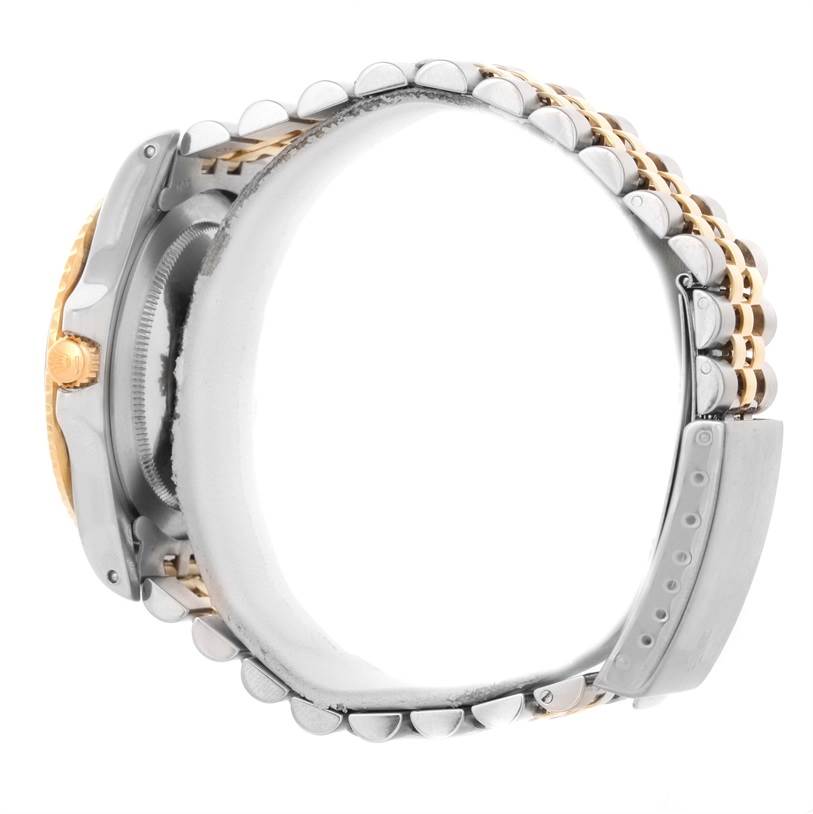 This image shows a side view of the Vintage Collection Rolex watch, highlighting its band and case details.