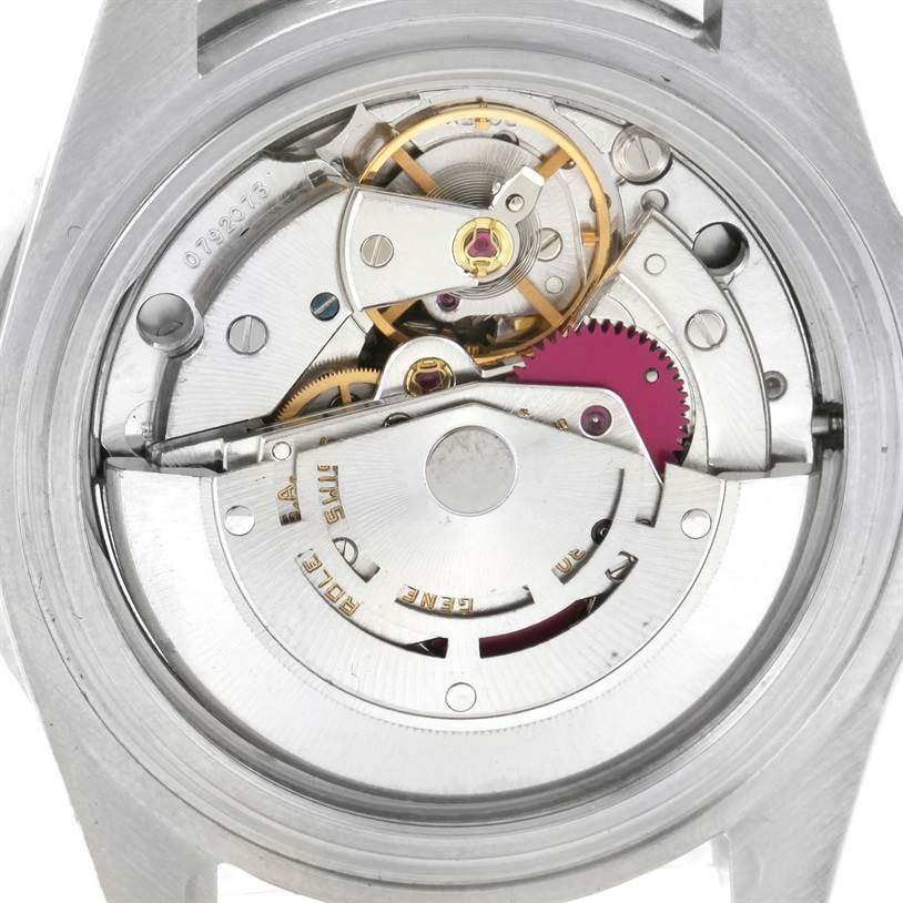 The image shows the internal mechanical components of the Vintage Collection model by Rolex from a rear angle.