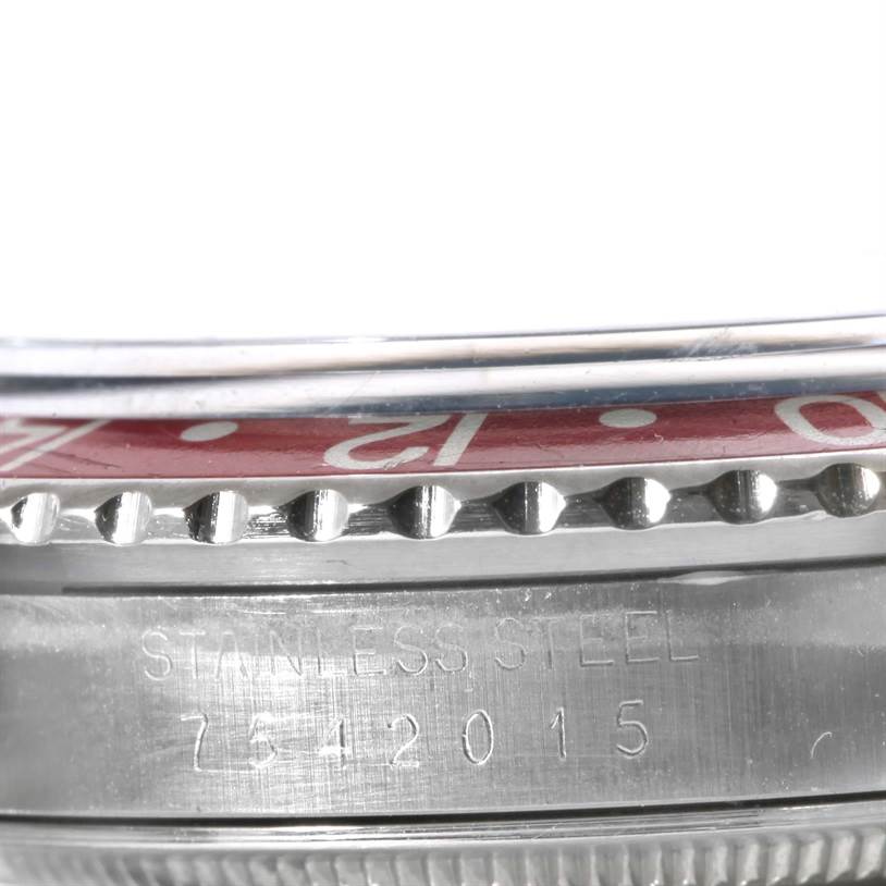 The image shows a close-up side view of the bezel and case of the Rolex Vintage Collection 16750 Men's Stainless Steel Black Dial 16750 Men's Stainless Steel Black Dial watch, including the stainless steel engraving and serial number.