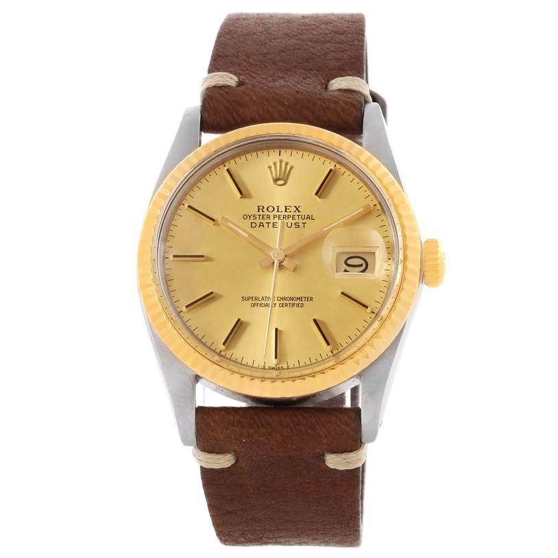 The image shows a frontal view of the Rolex Vintage Collection 16013 Men
s Stainless Steel Champagne Dial 16013 Men
s Stainless Steel Champagne Dial model Datejust watch with a brown leather strap.
