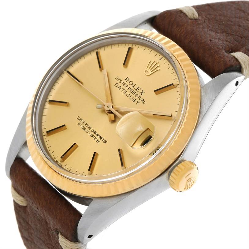 The Rolex Vintage Collection 16013 Men
s Stainless Steel Champagne Dial 16013 Men
s Stainless Steel Champagne Dial model Datejust watch is shown at a slight side angle, focusing on the dial, crown, and leather strap.