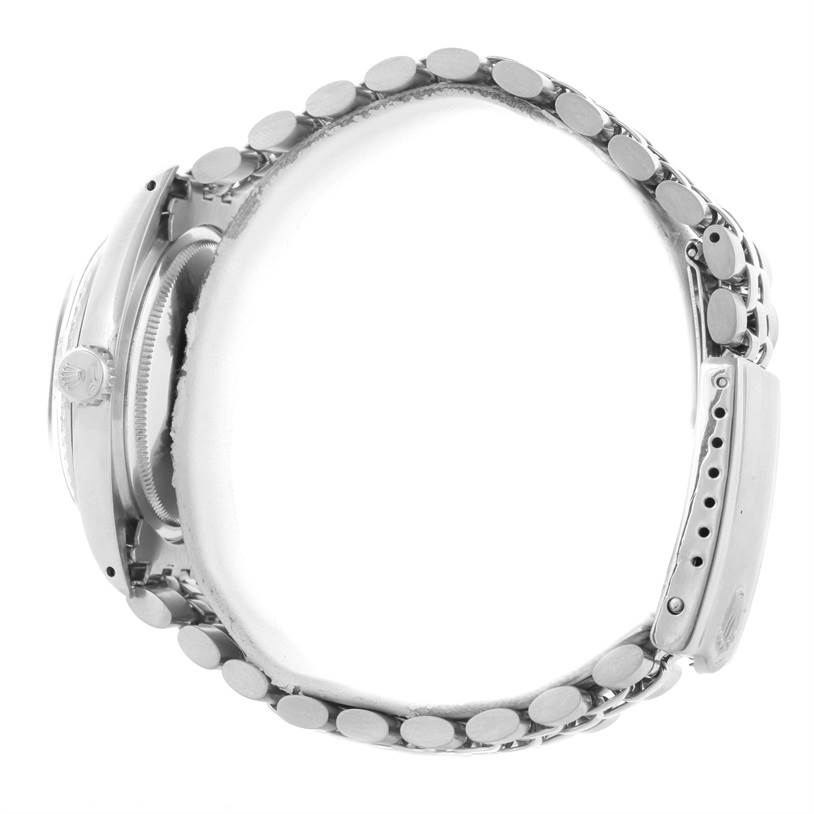 The image shows a side profile of a Rolex Vintage Collection 1603 Men's Stainless Steel Silver Dial 1603 Men's Stainless Steel Silver Dial watch with a visible crown and band.