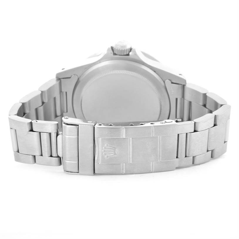 The image shows the back view of a Rolex Vintage Collection 1680 Men's Stainless Steel Black Dial 1680 Men's Stainless Steel Black Dial watch, focusing on the clasp and bracelet.