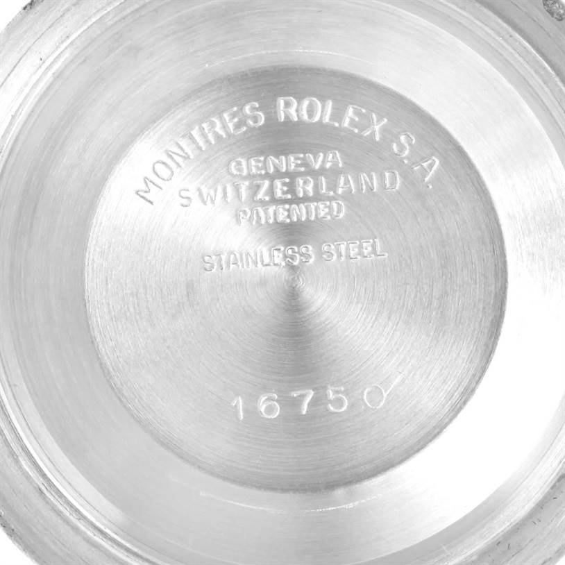This image shows the engraved caseback of a Vintage Collection Rolex watch model 16750.