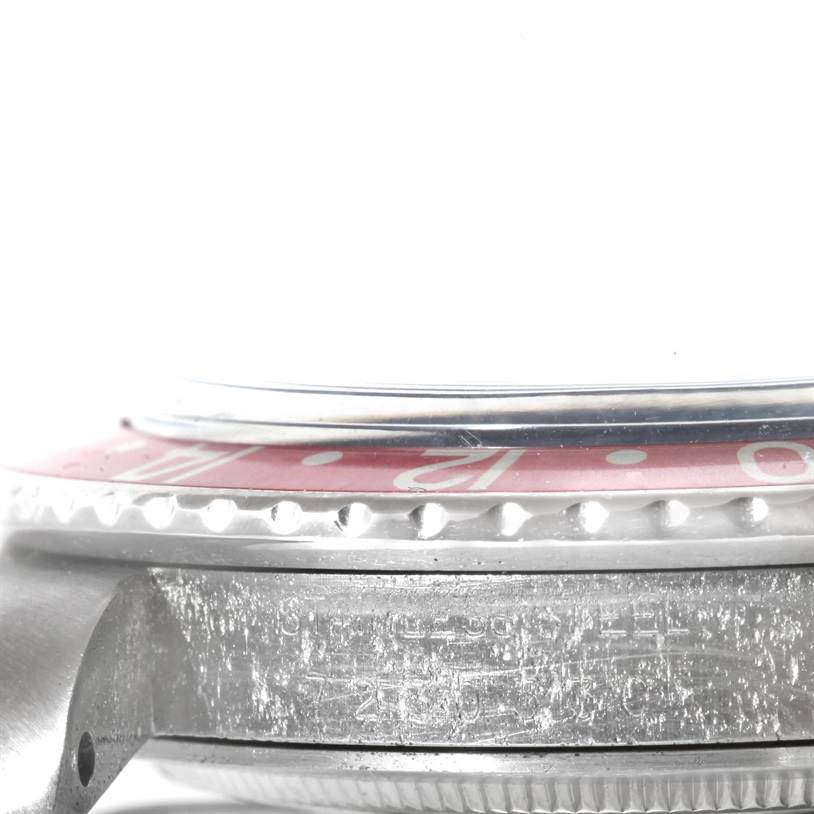 The image shows a close-up side view of the bezel, case, and part of the dial of the Rolex Vintage Collection 16750 Men's Stainless Steel Black Dial 16750 Men's Stainless Steel Black Dial model watch.