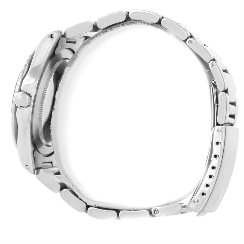 The image shows the side view of a Rolex Vintage Collection 16750 Men's Stainless Steel Black Dial 16750 Men's Stainless Steel Black Dial watch, focusing on the metal bracelet and crown.