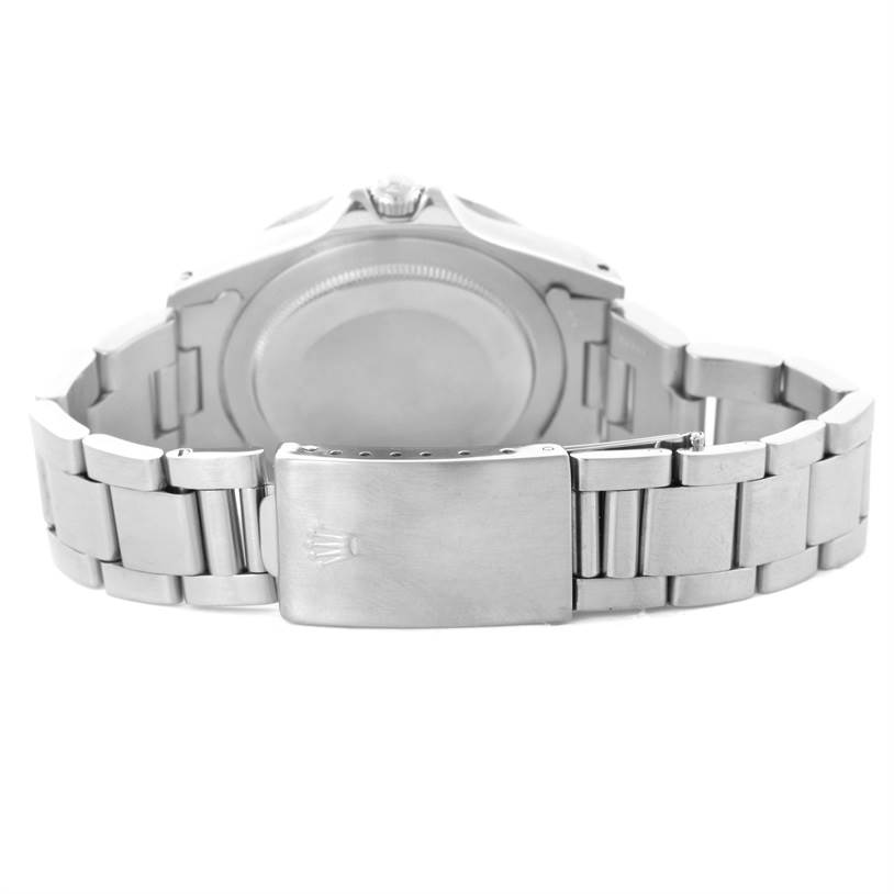 The image shows the back case and bracelet clasp of a Vintage Collection Rolex watch.