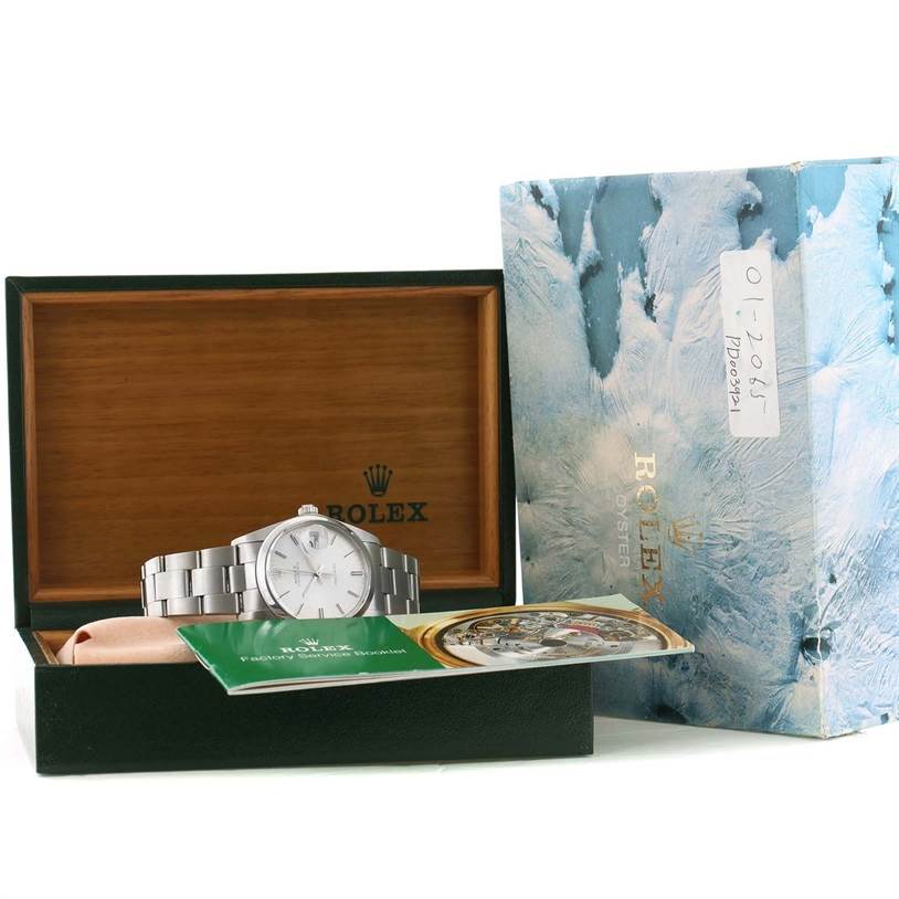 The image shows a Rolex Vintage Collection 6694 Men's Stainless Steel Black Dial 6694 Men's Stainless Steel Black Dial watch displayed in an open case with its original packaging and documentation visible.