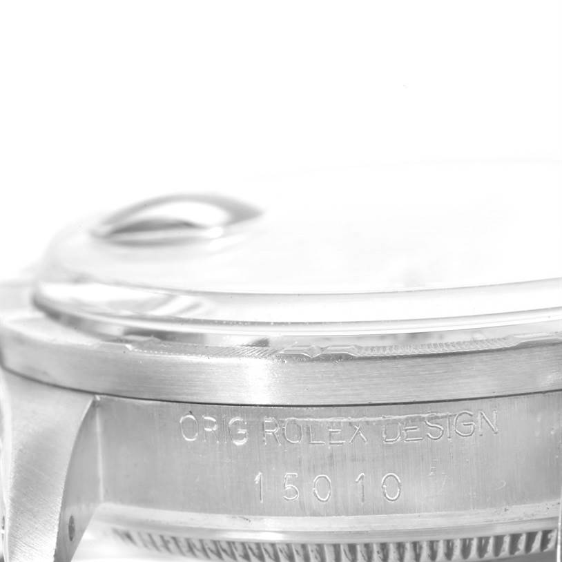 The image shows a close-up side view of a Rolex Vintage Collection 15010 Men's Stainless Steel Silver Dial 15010 Men's Stainless Steel Silver Dial model, highlighting the edge of the case and the engraved model number 15010.