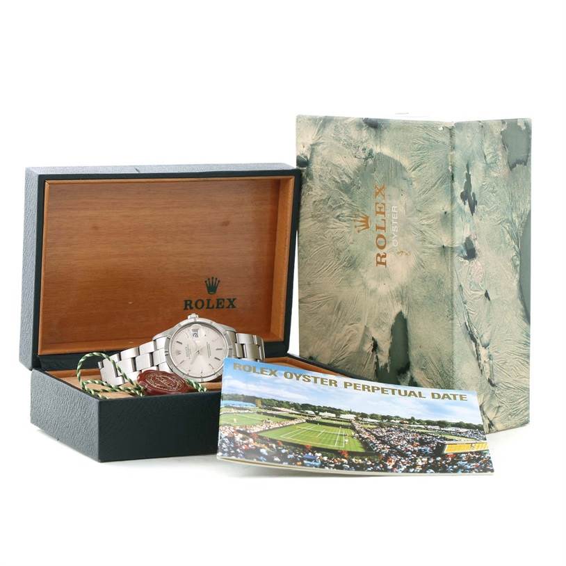 The image shows a Rolex Vintage Collection 15010 Men's Stainless Steel Silver Dial 15010 Men's Stainless Steel Silver Dial watch at a slight angle, displayed in its box with the outer box and a manual.