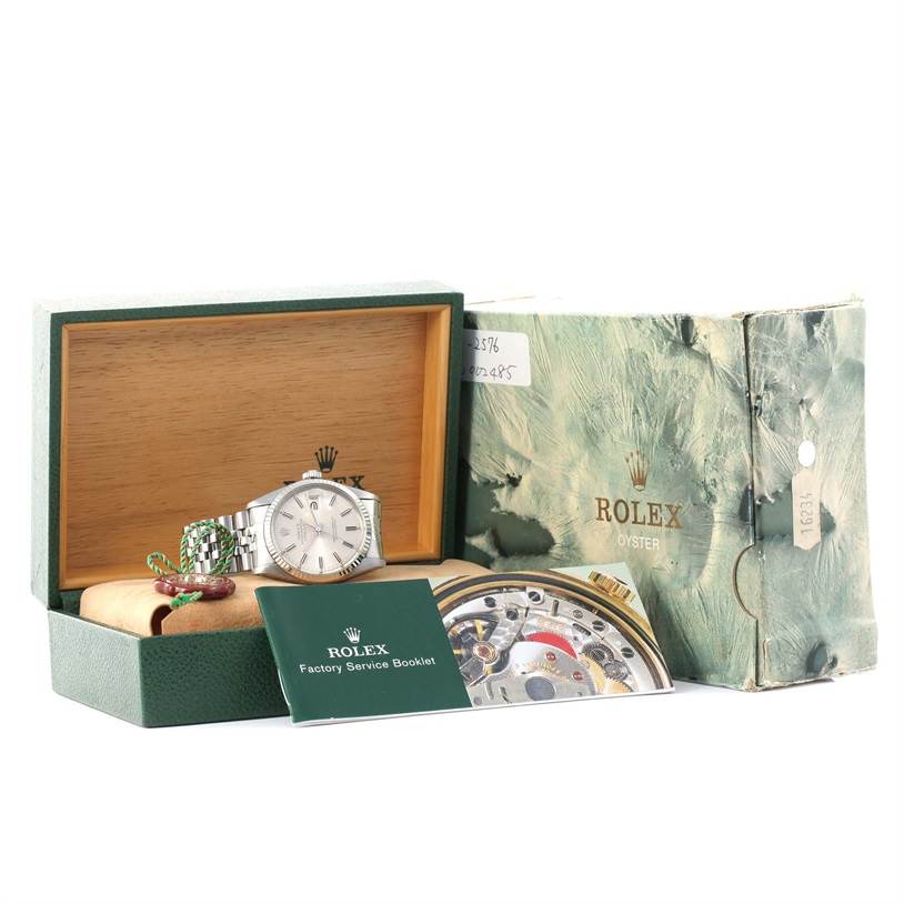 The image shows a Rolex Vintage Collection 16014 Men's Stainless Steel Silver Dial 16014 Men's Stainless Steel Silver Dial watch in its open box with a Rolex Factory Service booklet in the foreground.