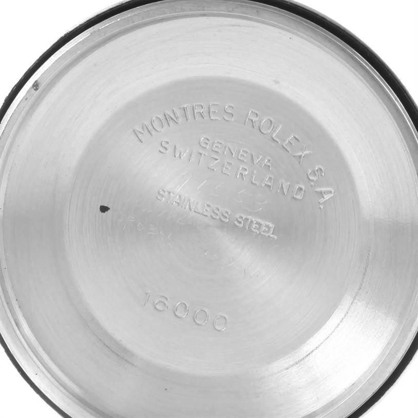 This image shows the inside case back of a Rolex Vintage Collection 16030 Men's Stainless Steel Silver Dial 16030 Men's Stainless Steel Silver Dial model with markings indicating "STAINLESS STEEL" and model number "16000."