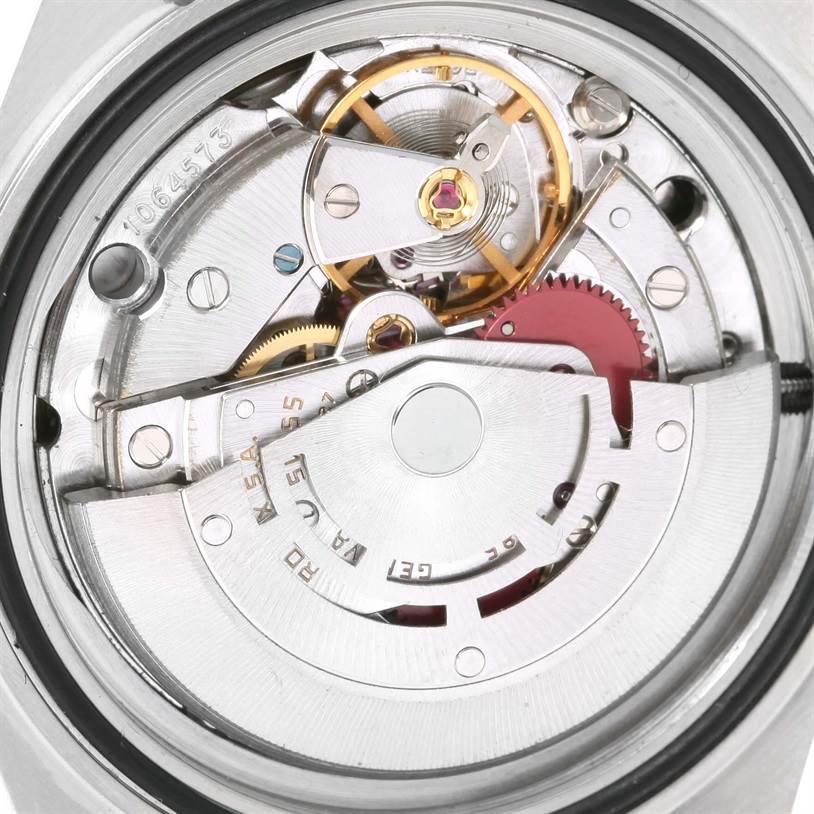This close-up shows the intricate internal mechanism of a Rolex Vintage Collection 16760 Men's Stainless Steel Black Dial 16760 Men's Stainless Steel Black Dial watch.