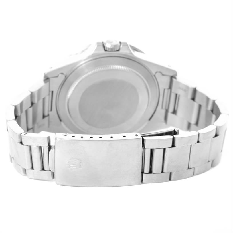 The image shows the back of a Rolex Vintage Collection 16760 Men's Stainless Steel Black Dial 16760 Men's Stainless Steel Black Dial watch, focusing on the case back and the metal bracelet with its clasp.