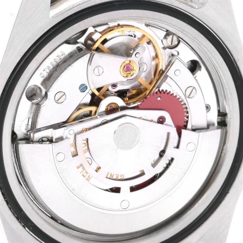 This close-up image shows the inner mechanical movement of a Rolex Vintage Collection 16753 Men's Stainless Steel Brown Dial 16753 Men's Stainless Steel Brown Dial watch.